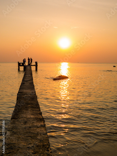 People on the pier at sunset. In Phu Quoc island  Vietnam