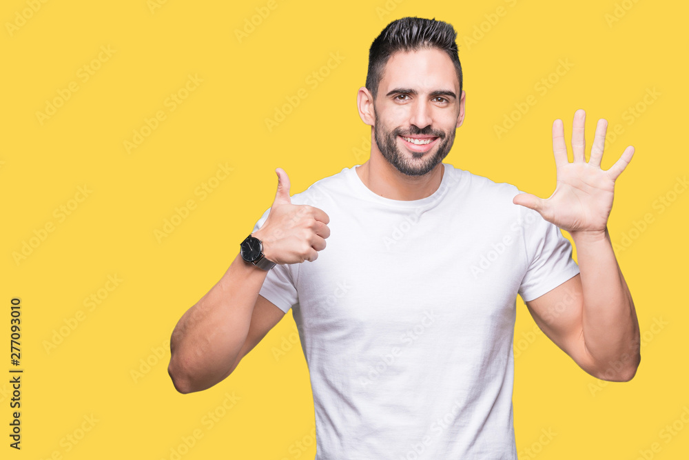 Young man wearing casual white t-shirt over isolated background showing and pointing up with fingers number six while smiling confident and happy. Young man wearing casual white t-shirt over isolated background showing and pointing up with fingers number six while smiling confident and happy.