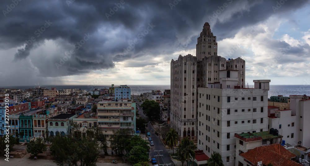 Aerial Panoramic view of the Havana City, Capital of Cuba, during a dramatic and storm cloudy day.