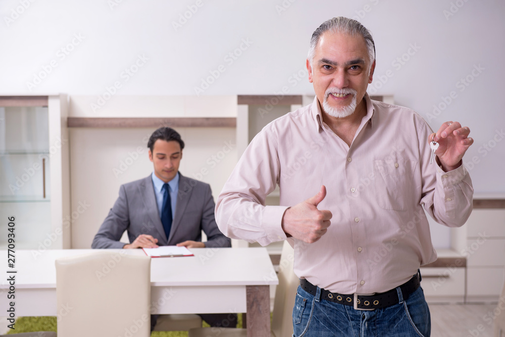 Male real estate agent and male client in the apartment Male real estate agent and male client in the apartment