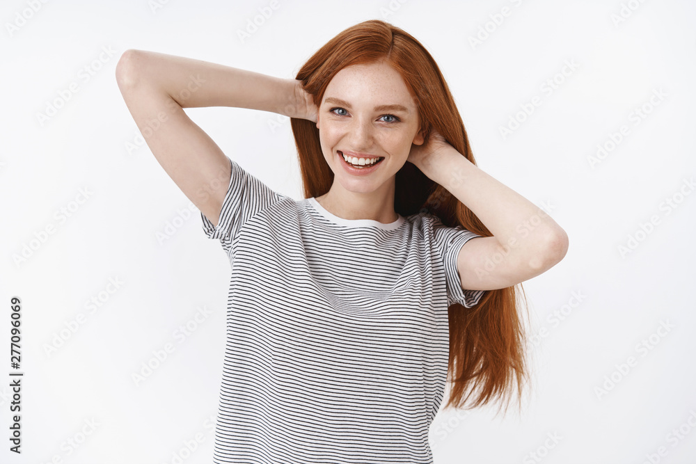 Carefree confident sassy young redhead girl proud perfect healthy ginger long hair touchign hairstyle smiling delighted self-assured like great shampoo recommend haircare product, white background Carefree confident sassy young redhead girl proud perfect healthy ginger long hair touchign hairstyle smiling delighted self-assured like great shampoo recommend haircare product, white background
