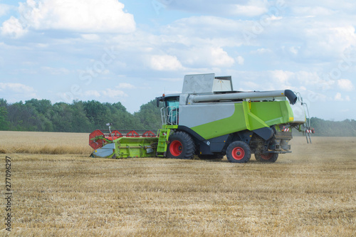 Harvesting wheat and barley modern combine.