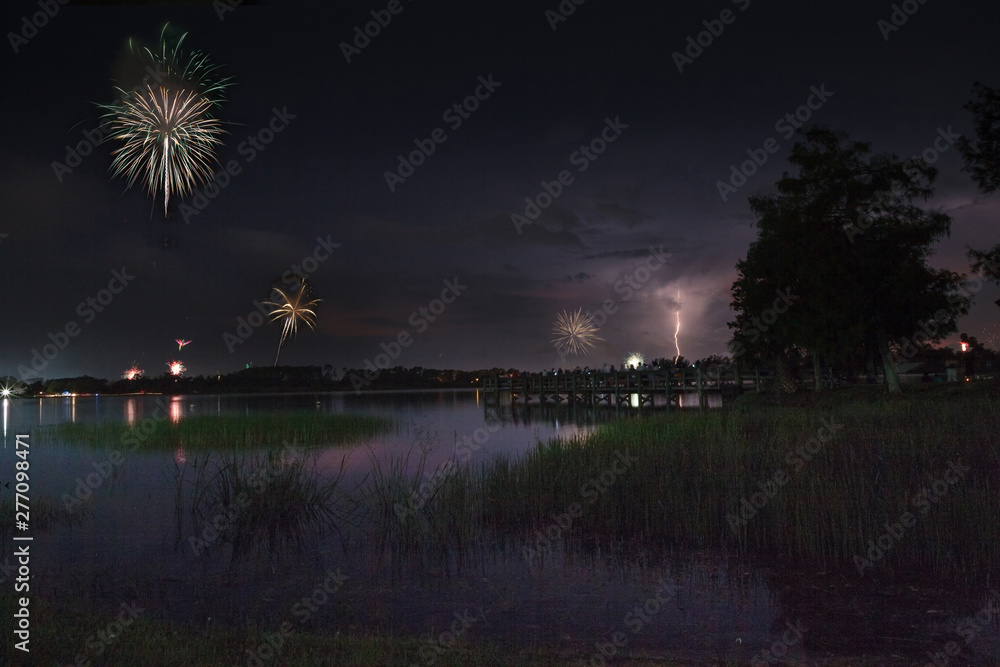 Lightning and Fireworks over Sugden Regional Park in Naples, Florida