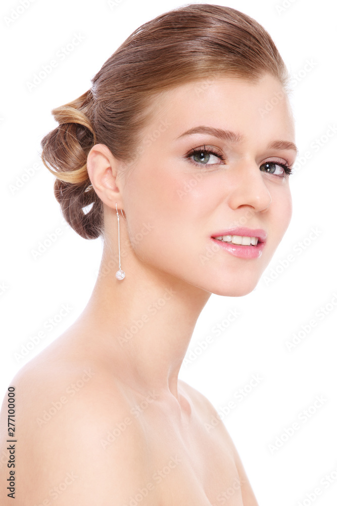 Young beautiful girl with prom makeup and hairdo