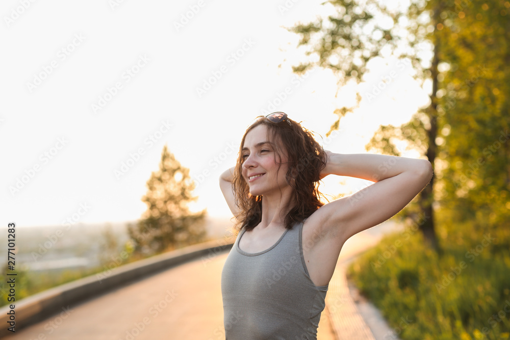 brunette girl doing sport exercises, stretching