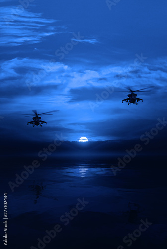 Fototapeta Naklejka Na Ścianę i Meble -  Combat helicopter against the moonlit sky. night operation