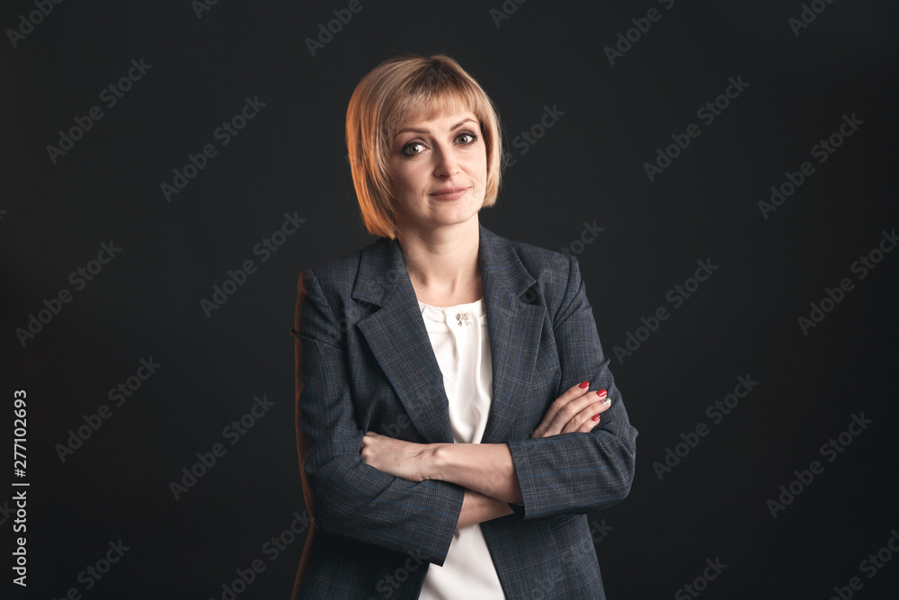 Portrait of businesswoman in the suit isolated in a studio Portrait of businesswoman in the suit isolated in a studio