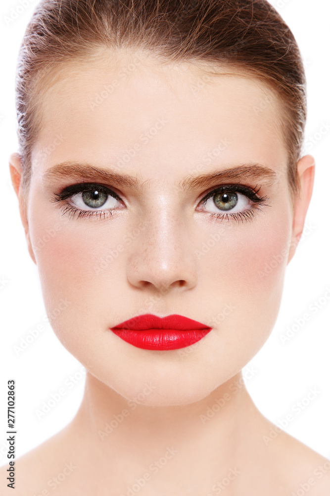 Close-up portrait of beautiful green-eyed woman with red lipstick Close-up portrait of beautiful green-eyed woman with red lipstick