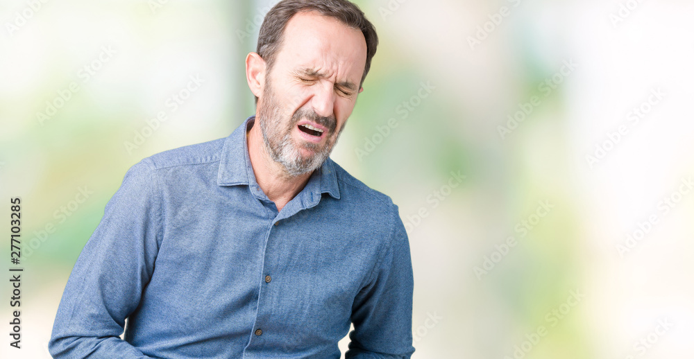 Handsome middle age elegant senior man over isolated background with hand on stomach because nausea, painful disease feeling unwell. Ache concept. Handsome middle age elegant senior man over isolated background with hand on stomach because nausea, painful disease feeling unwell. Ache concept.