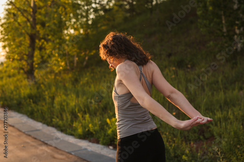 brunette girl doing sport exercises, stretching © natalialeb