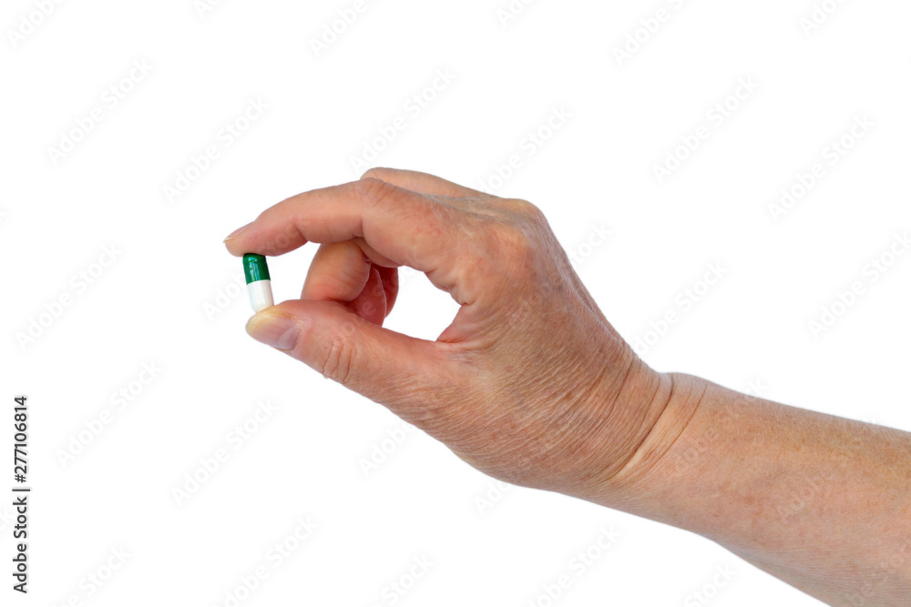 hand with pills on white background hand with pills on white background