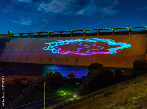 Light show projected onto dam