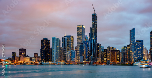 Panoramic view of Chicago city high rise buildings cloudy sky in the evening