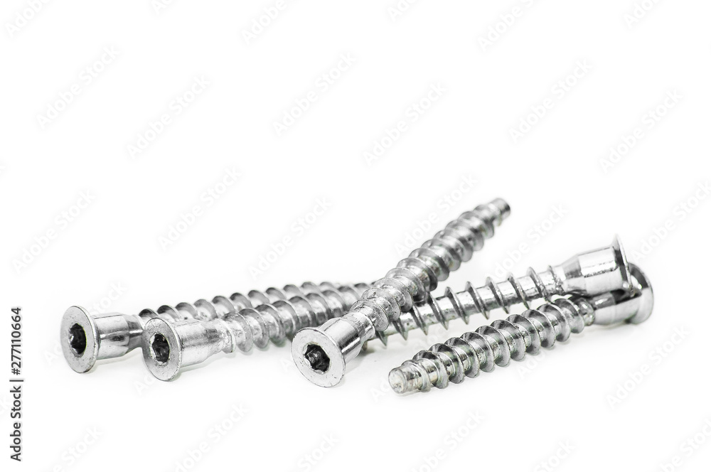 Screws still life large self tapping screws on white background. Selective focus. Screws still life large self tapping screws on white background. Selective focus.