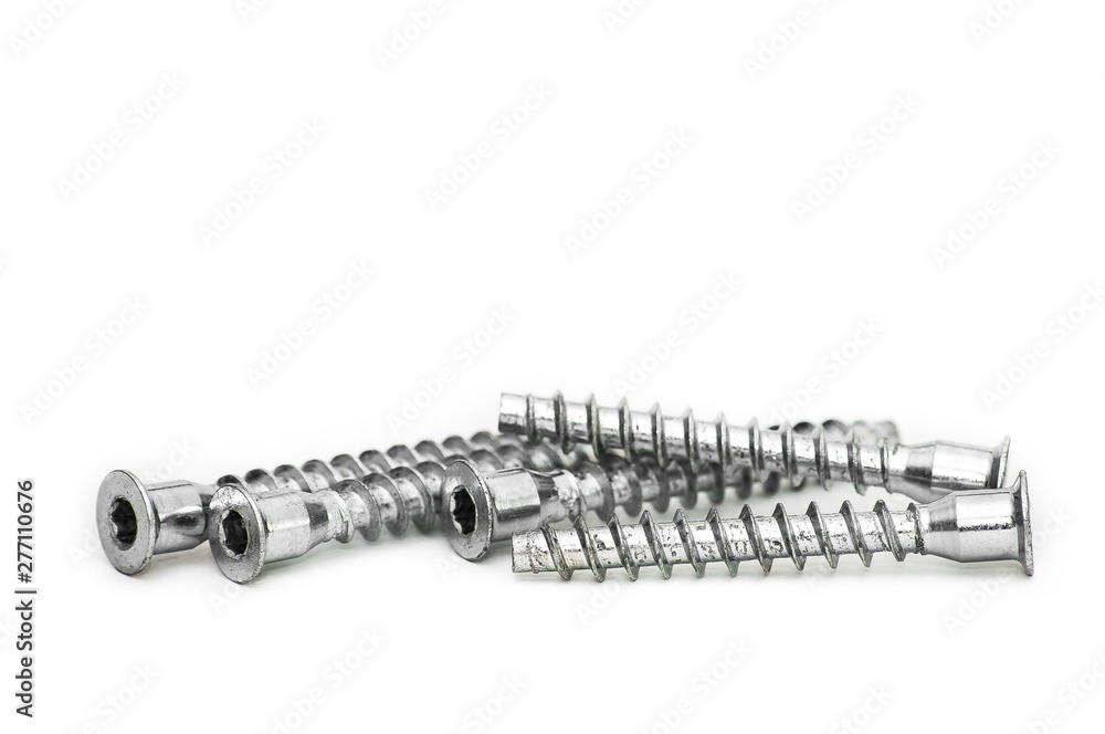Screws still life large self tapping screws on white background. Selective focus.
