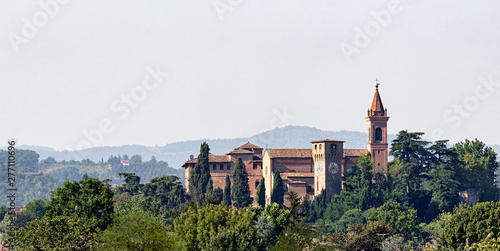 View of the ancient village of Bazzano, BO. castle, church and tower photo