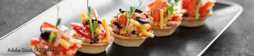 Delicious salad in tartlets. Concept of food, restaurant, cateri photo