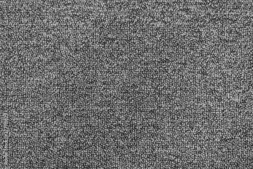 Generic and seamless grey carpet background texture.