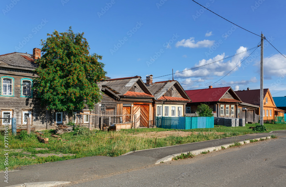 Village street in summer. Village of Visim, Sverdlovsk region, Russia.
