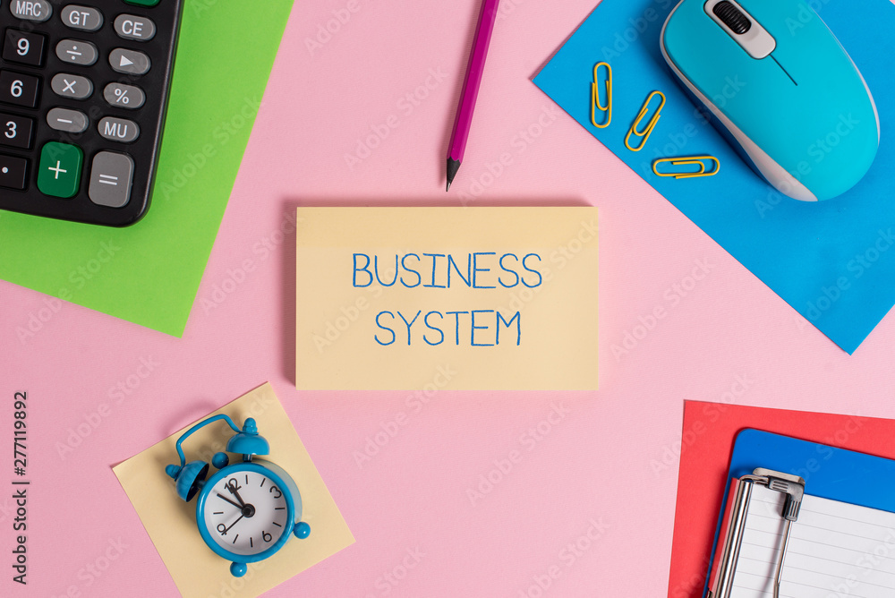 Conceptual hand writing showing Business System. Concept meaning A method of analyzing the information of organizations Mouse calculator sheets marker clipboard clock color background