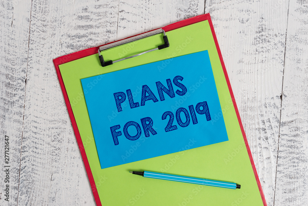 Text sign showing Plans For 2019. Business photo showcasing an intention or decision about what one is going to do Colored clipboard blank paper sheet marker sticky note wooden background Text sign showing Plans For 2019. Business photo showcasing an intention or decision about what one is going to do Colored clipboard blank paper sheet marker sticky note wooden background