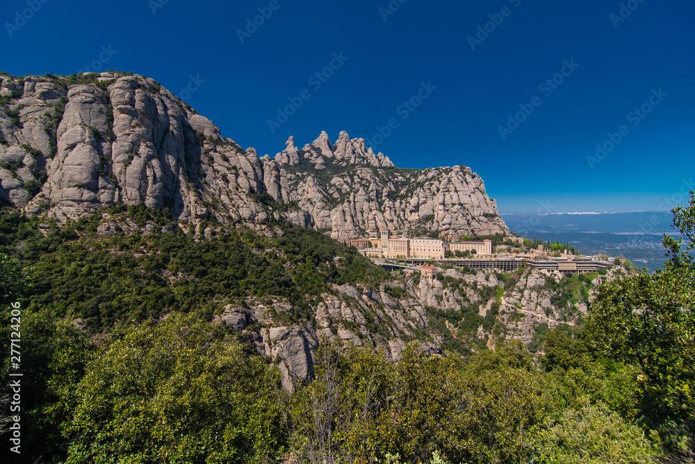 Aerial view on Santa Maria de Montserrat Abbey in Montserrat mountains, Spain Aerial view on Santa Maria de Montserrat Abbey in Montserrat mountains, Spain