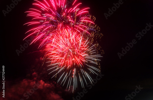 Beautiful colorful holiday fireworks in the evening with majestic long exposure