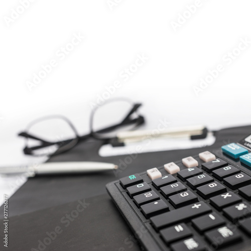 calculator and documents for working on the table, Finance and savings, Business concept.