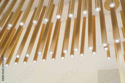 modern light bulbs hanging in department store  with decorate interior luxury 