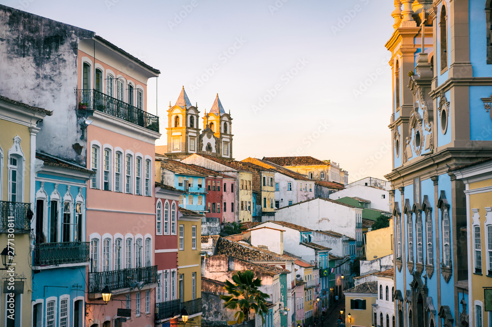 Scenic dusk view of a historic plaza surrounded by colonial buildings in the tourist district of Pelourinho, in Salvador, Bahia, Brazil