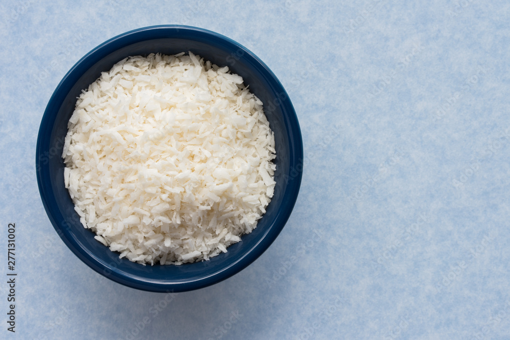 Unsweetened Shredded Coconut in a Bowl Unsweetened Shredded Coconut in a Bowl