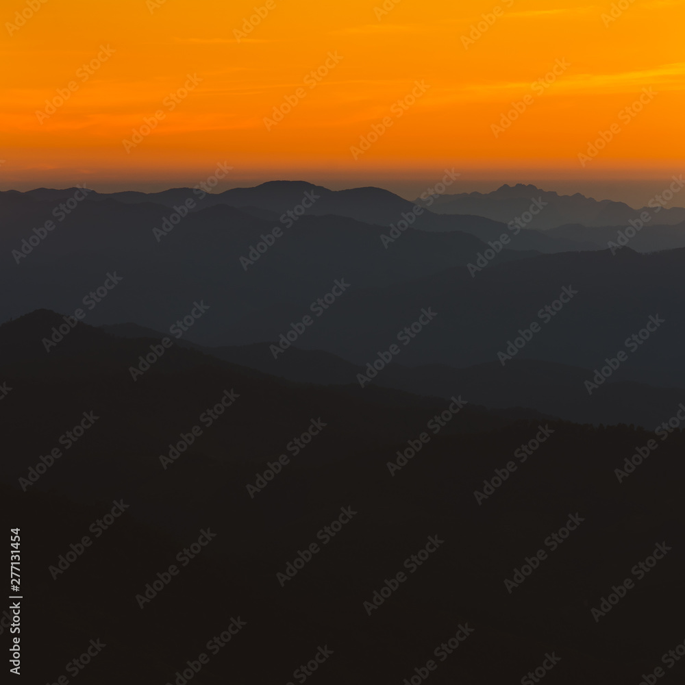 Scenic sunset and mountain view between the hiking route to Doi pui ko, Mae hong son, Thailand.