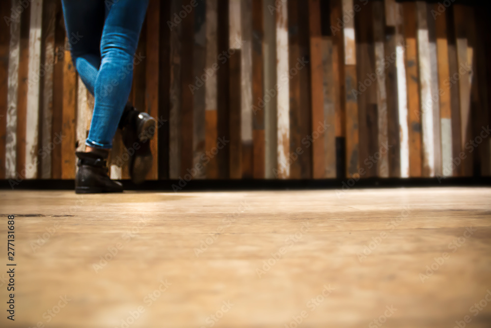 legs of someone waiting at a counter in a store legs of someone waiting at a counter in a store