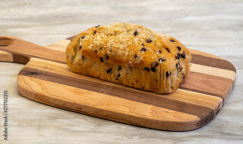 Loaf of chocolate chip bread on cutting board