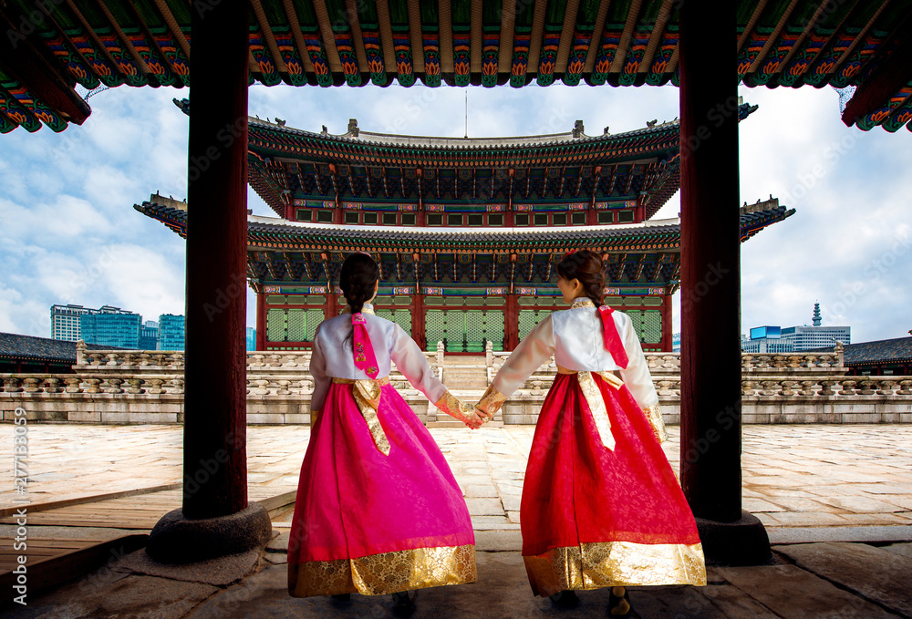 Korean women wearing Hanbok in ancient town, Seoul, Korea