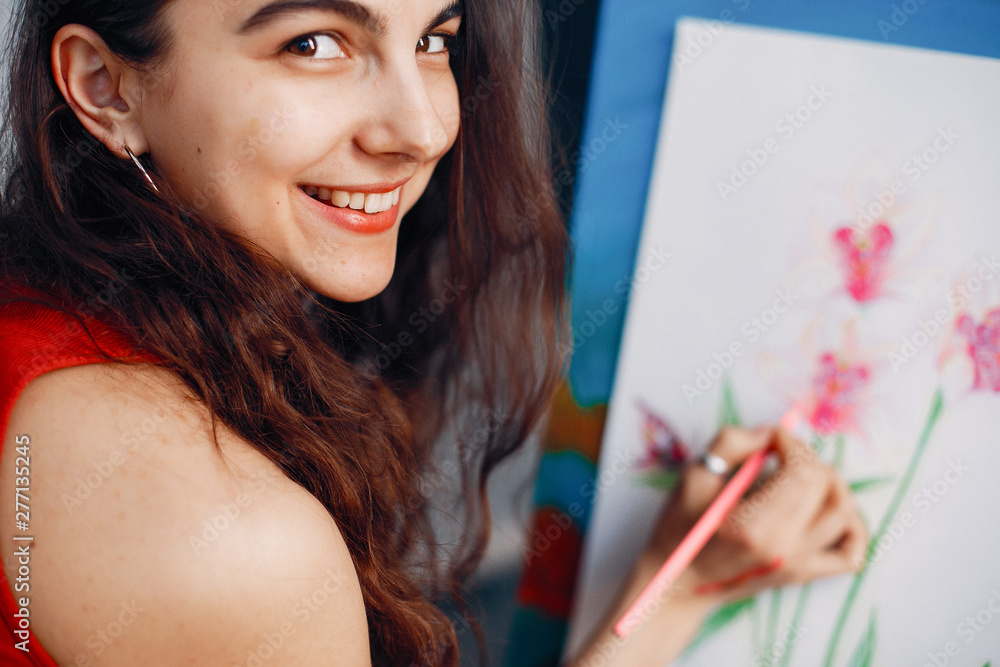 Girls in an art studio. Brunette in a shirt. Lady draws Girls in an art studio. Brunette in a shirt. Lady draws
