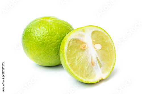 close up of lime slice on white background