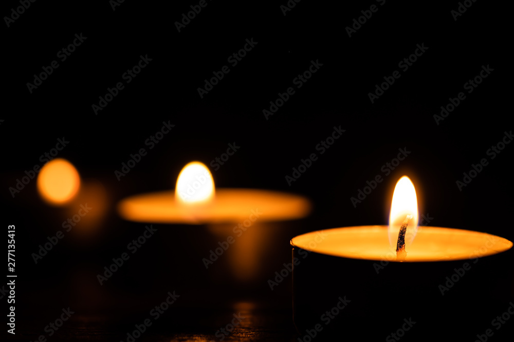 candles on dark low key background