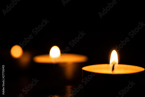 candles on dark low key background