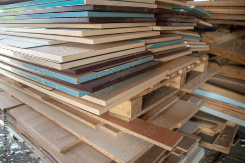 Taking photographs of wood plywood, used for making pellets