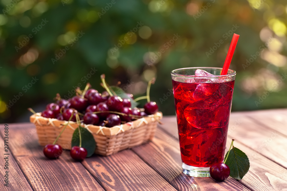 cherry juice or cocktail with ice in glass cherry juice or cocktail with ice in glass
