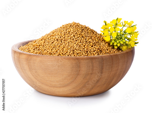 Photography mustard seeds in wooden bowl