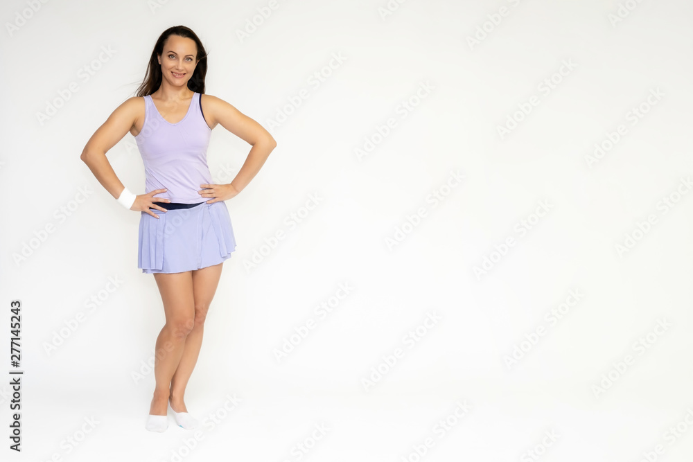 Full-length portrait on white background of beautiful pretty fitness girl woman in trendy tennis sport uniform, with different emotions in different poses, shows hands. Smiles. Stylish trendy youth. Full-length portrait on white background of beautiful pretty fitness girl woman in trendy tennis sport uniform, with different emotions in different poses, shows hands. Smiles. Stylish trendy youth.