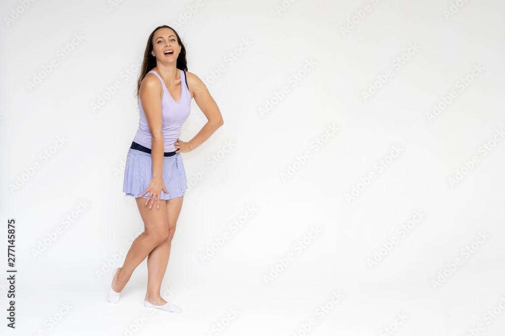 Full-length portrait on white background of beautiful pretty fitness girl woman in trendy tennis sport uniform, with different emotions in different poses, shows hands. Smiles. Stylish trendy youth. Full-length portrait on white background of beautiful pretty fitness girl woman in trendy tennis sport uniform, with different emotions in different poses, shows hands. Smiles. Stylish trendy youth.