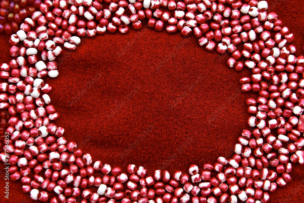 Macro image of small glass red beads Macro image of small glass red beads