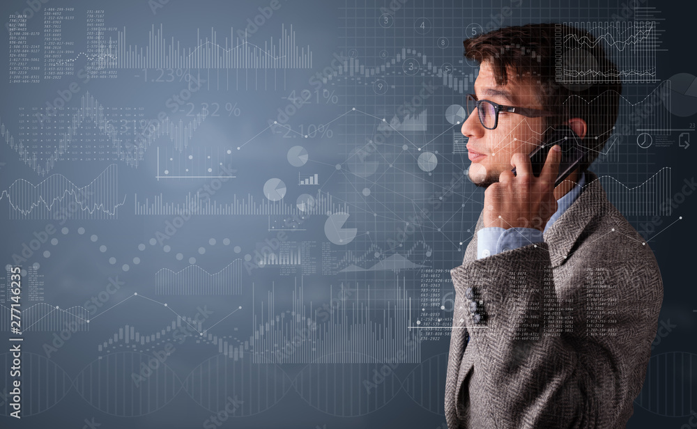 Young person talking on the phone with charts and reports in the foreground Young person talking on the phone with charts and reports in the foreground