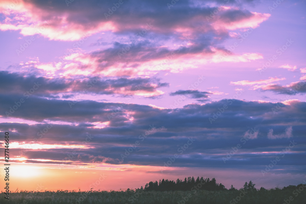 Magical sunset in the countryside. Rural landscape in the evening Magical sunset in the countryside. Rural landscape in the evening