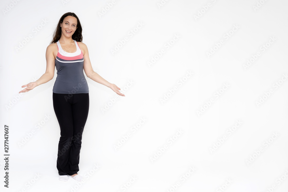 Full-length portrait on white background of beautiful pretty fitness girl woman in sports uniform, sitting on the stairs with different emotions in different poses. Stylish trendy youth. Full-length portrait on white background of beautiful pretty fitness girl woman in sports uniform, sitting on the stairs with different emotions in different poses. Stylish trendy youth.