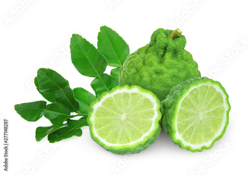 whole and half bergamot with leaf isolated on white background