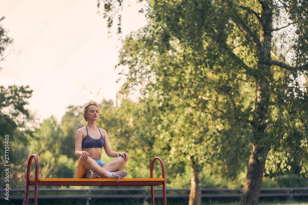 athletic girl doing yoga in the early morning athletic girl doing yoga in the early morning